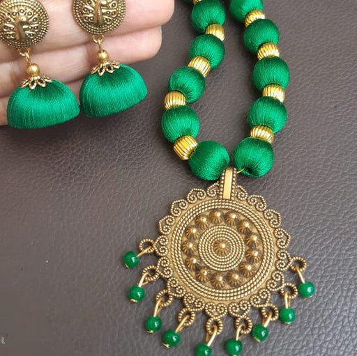 Silk thread necklace with deals antique pendant